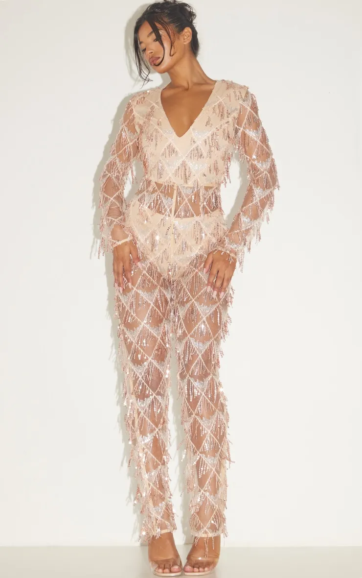 Combinaison rose gold à sequins et décolleté plongeant
