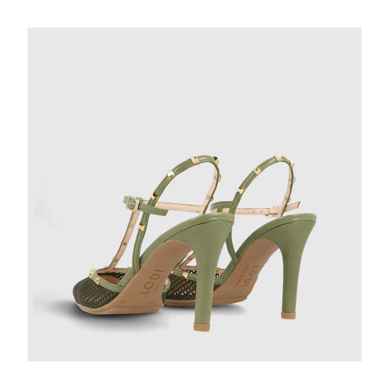Escarpin talon ouvert Revino-go en tissu textile avec détail de résille sur le devant et brides en cuir verni vert avec clous do