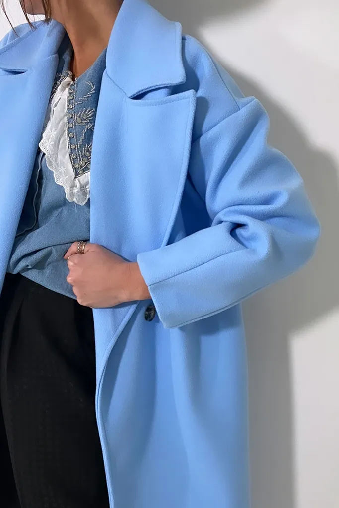 Manteau bleu ciel