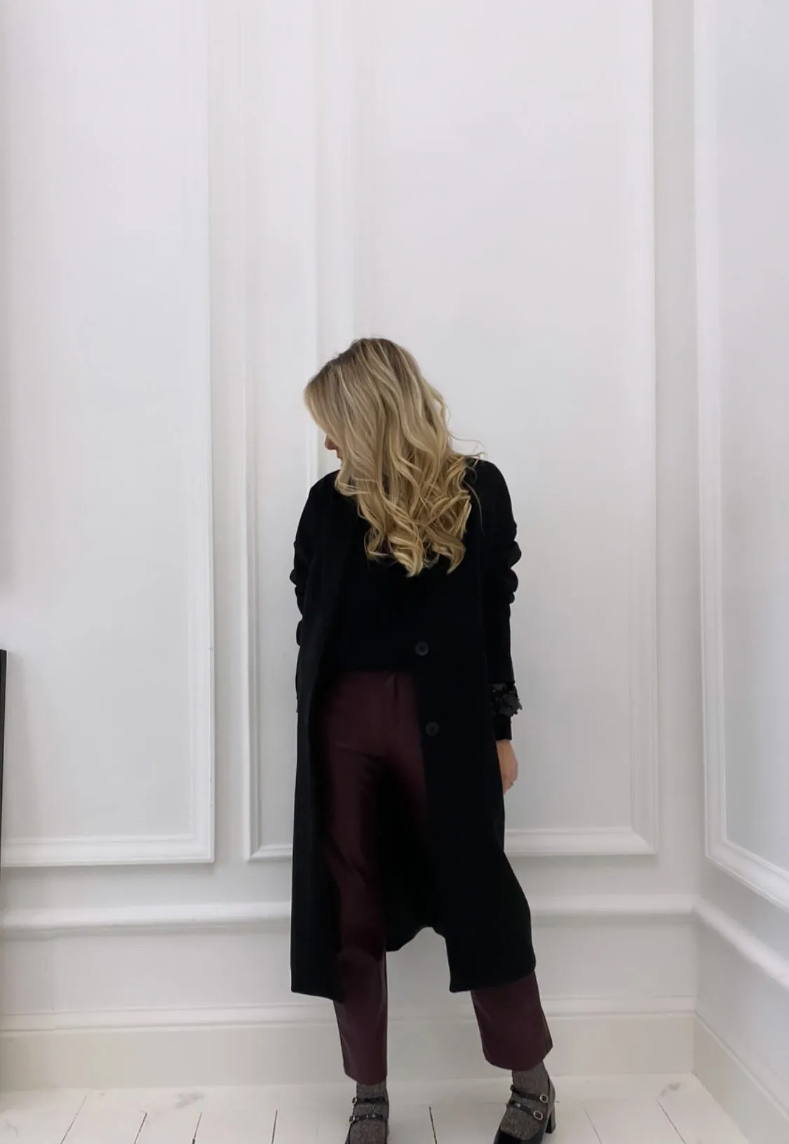 Manteau noir long double boutonnage