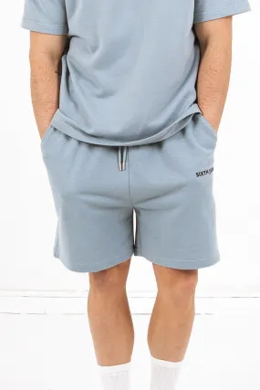 Short essential logo Bleu